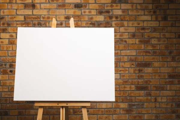 white-canvas-on-wooden-easel-and-copy-space-on-bri-2025-04-03-02-29-13-utc